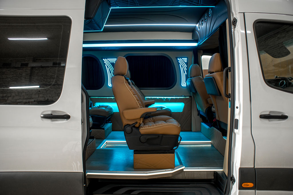 Comfortable interior of a passenger bus with soft seats